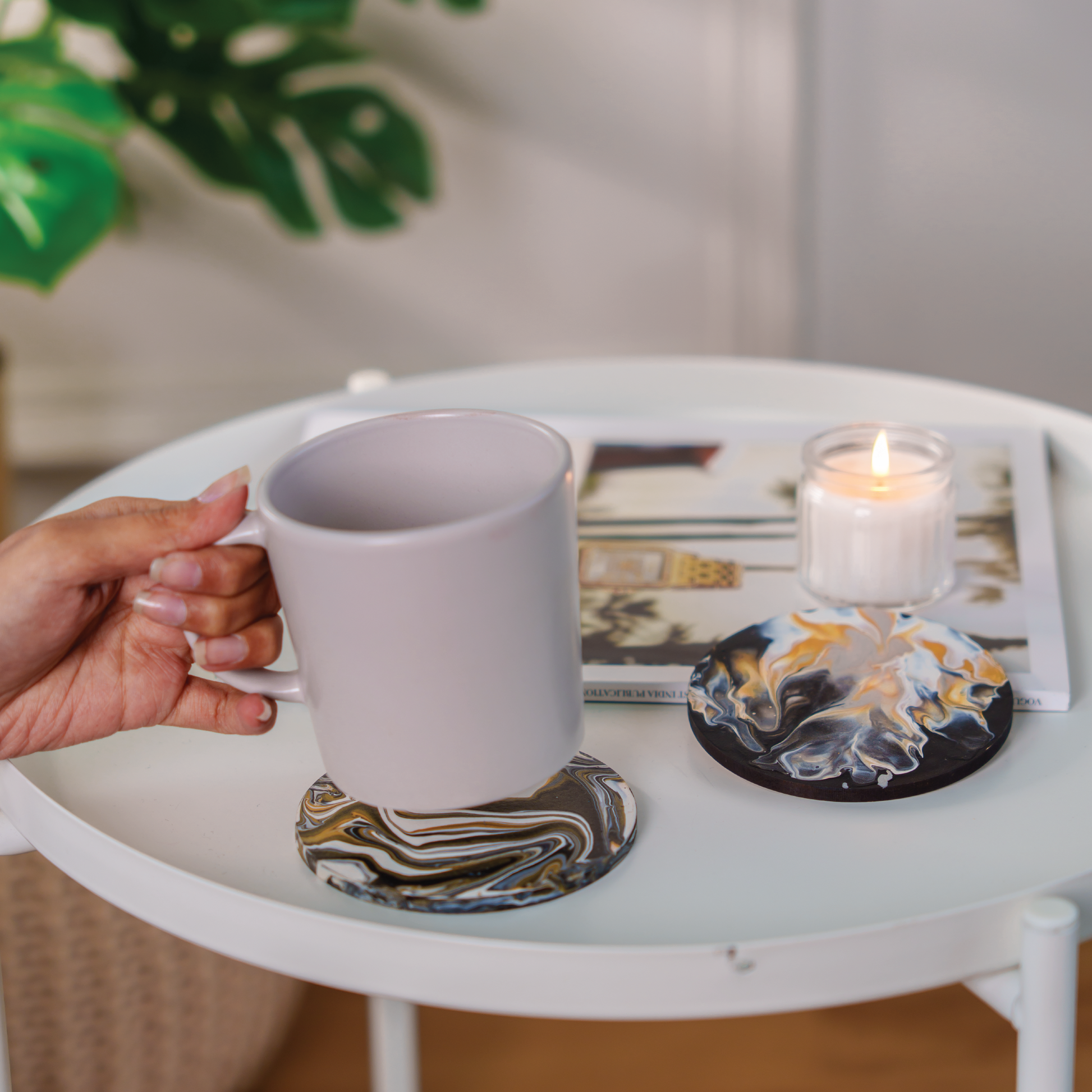 lifestyle picture of DIY pour painted coasters 